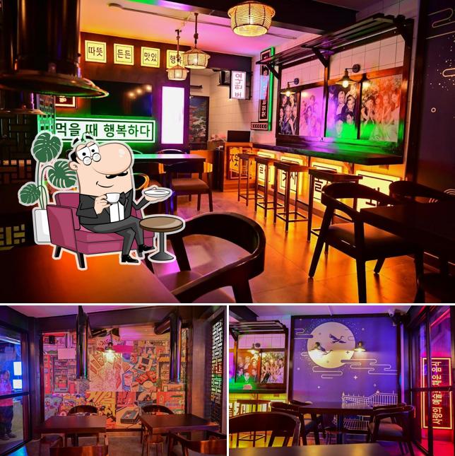 Take a seat at one of the tables at TaoBao Mysore