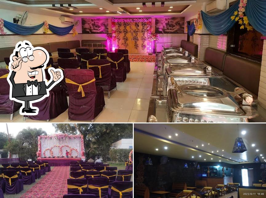 Take a seat at one of the tables at Hideout Lounge & Restaurant