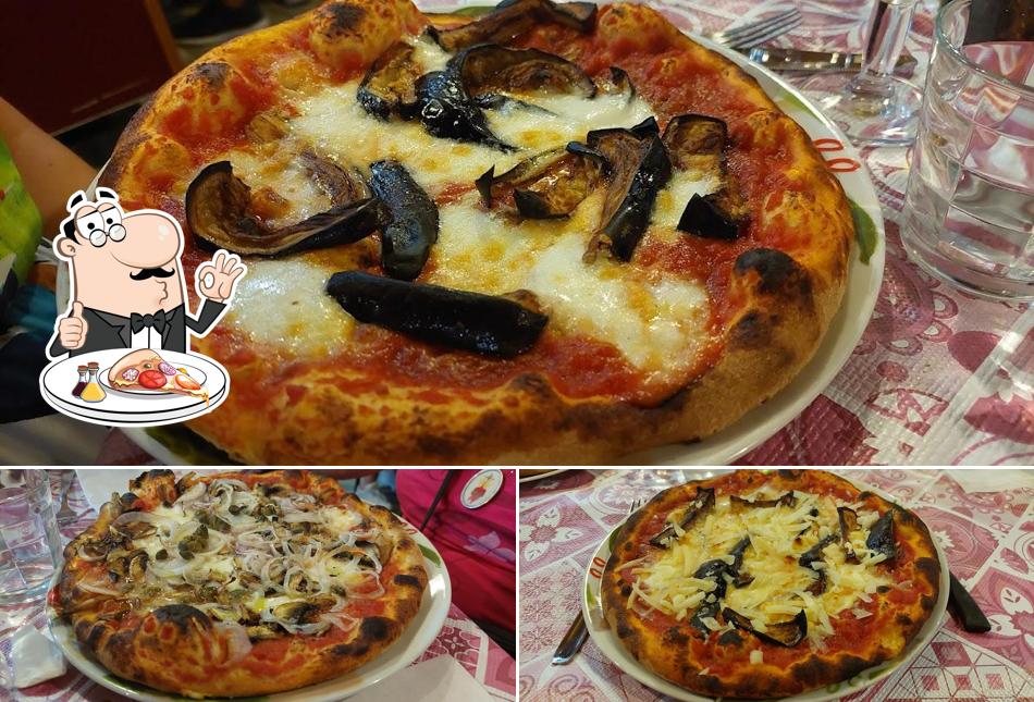 A Al Vecchio Mulino - Ristorante Pizzeria Wine Bar, puoi provare una bella pizza