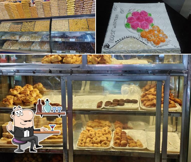 This is the image displaying interior and food at Krishna Bakery