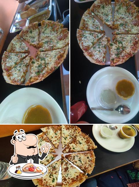 Get pizza at Idli Dosa