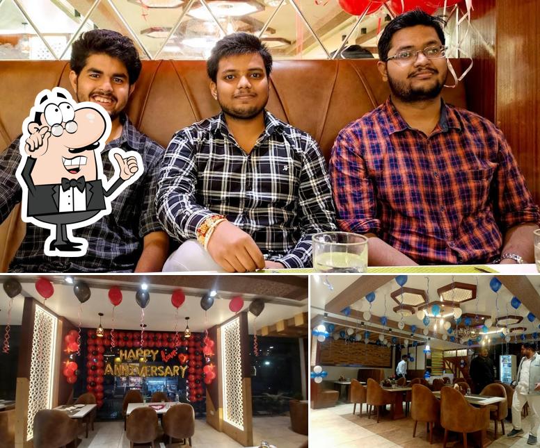 Take a seat at one of the tables at Kohinoor Restaurant Gorakhpur