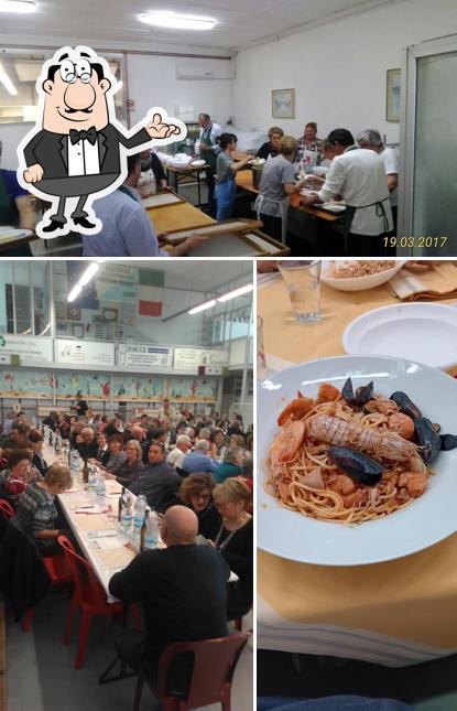 Questa è la immagine che mostra la interni e cibo di Bocciofila Polisportiva Osteria Grande