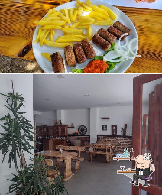 Siediti a un tavolo di Bistro del Mar