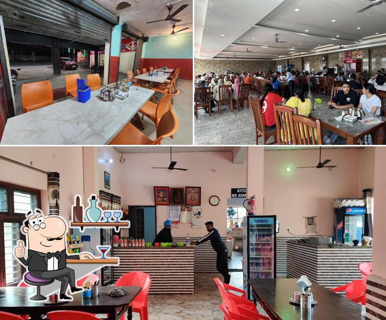 Take a seat at one of the tables at khaira Punjabi dhaba