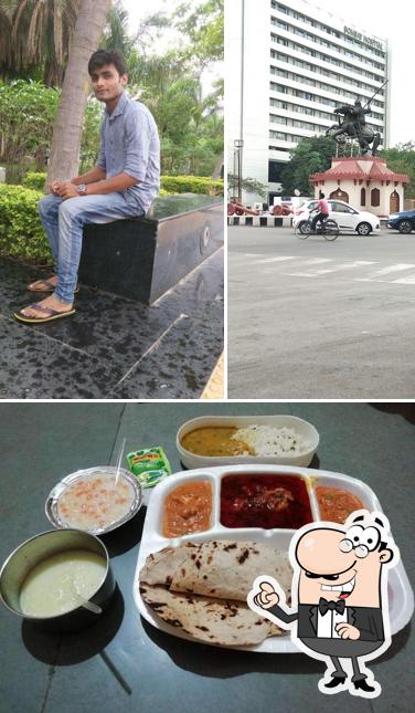 The photo of exterior and food at Om Sai Ram Restaurant