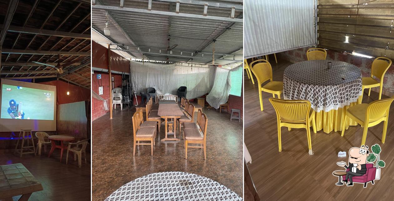 Take a seat at one of the tables at Hotel Shinde mala