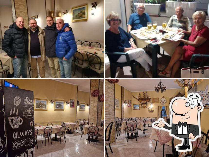 Dai un'occhiata agli interni di pizzeria dinner