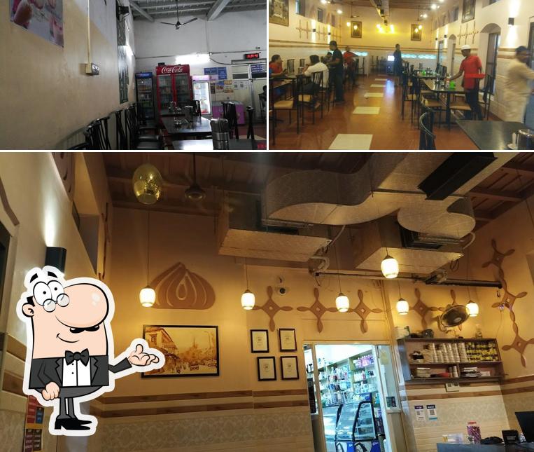 Take a seat at one of the tables at Halais Restaurant