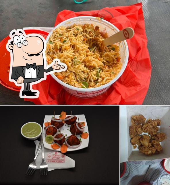 This is the image showing interior and food at SS Hyderabad Biryani-IRUNGATTUKOTTAI