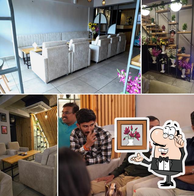 Take a seat at one of the tables at Devi Coffee Day