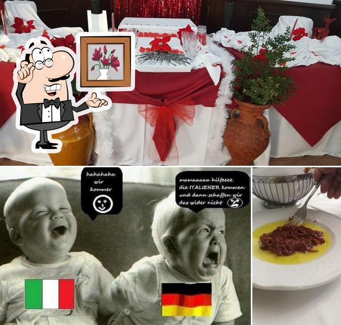 Dai un'occhiata agli interni di La Corte Trattoria & Pizzeria Bakery