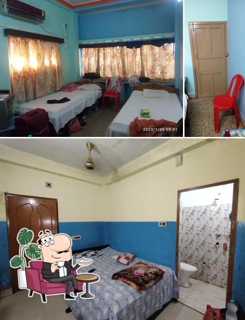 Take a seat at one of the tables at HOTEL ANJALI