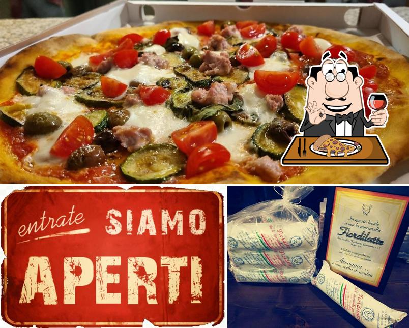 Scegli una pizza a Pizzeria per asporto "Ah, Beh; Sì Beh"