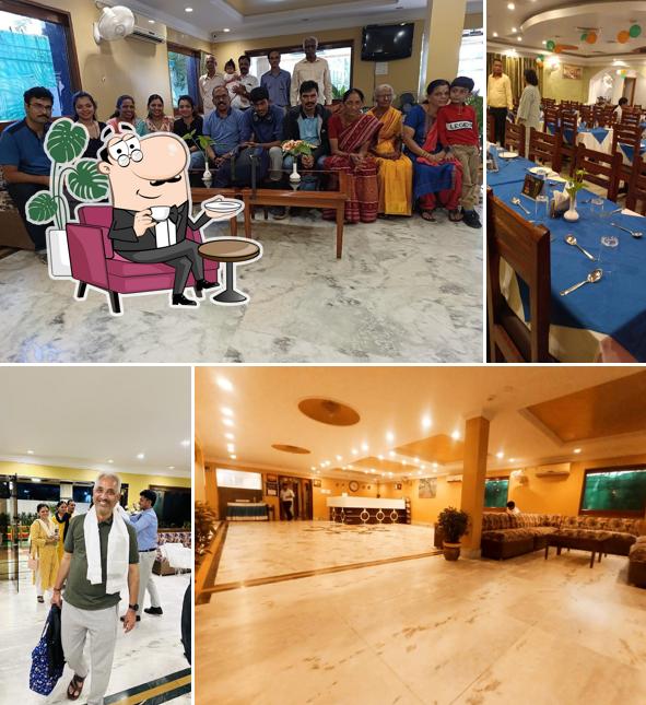 Take a seat at one of the tables at Hotel Taj Darbar