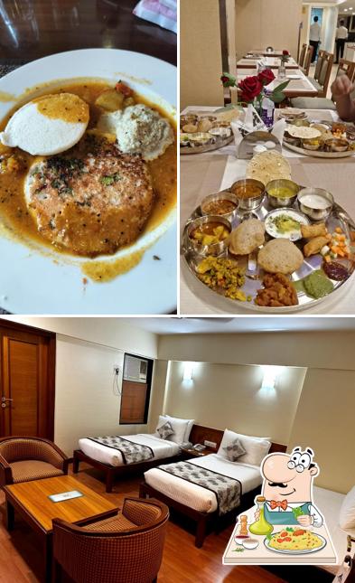 Among different things one can find food and interior at Hotel Abigail Regency