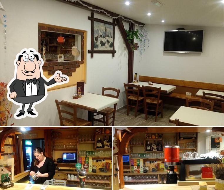 Siediti a un tavolo di Gostilna In Pizzeria Grajska Preža
