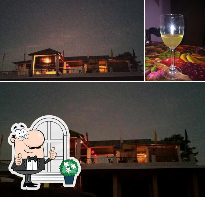 Among various things one can find exterior and alcohol at Machan Restaurant