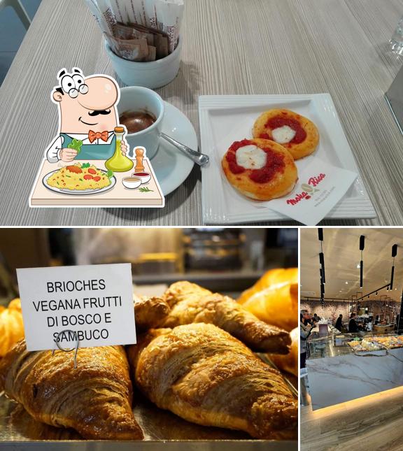 Tra le varie cose da Pasticceria Le Plaisir si possono trovare la cibo e interni