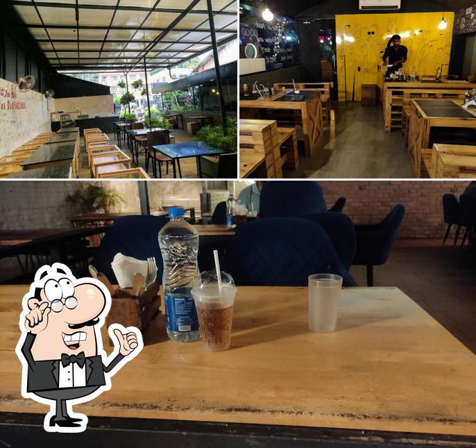 Take a seat at one of the tables at 12 to 12 Bar-Be-Que