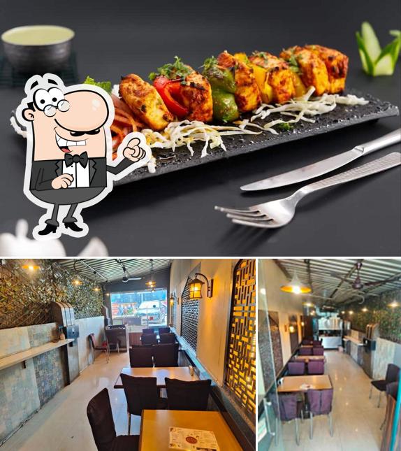 Check out the picture depicting interior and beverage at KebabNama