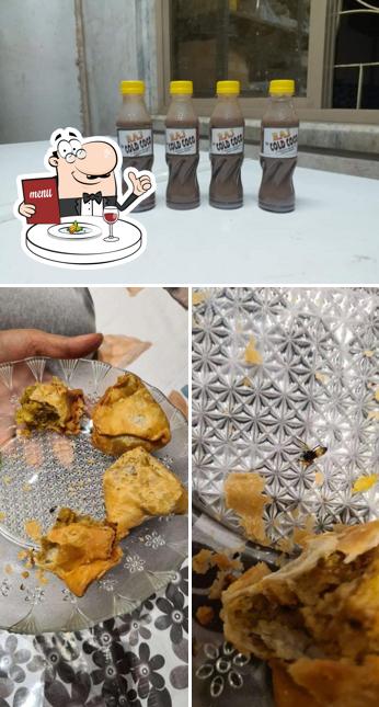 Check out the photo showing food and beverage at Guddubhai Mathurawale Samosa Center