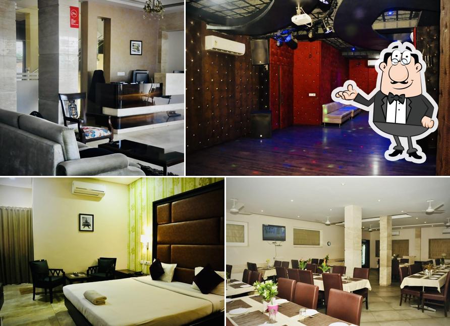 Take a seat at one of the tables at Hotel surya palace