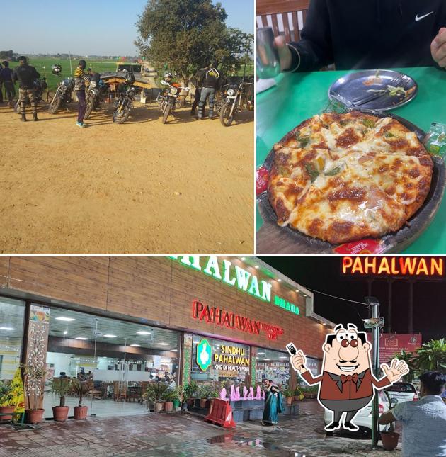 Check out the image showing food and exterior at Pahalwan Dhaba