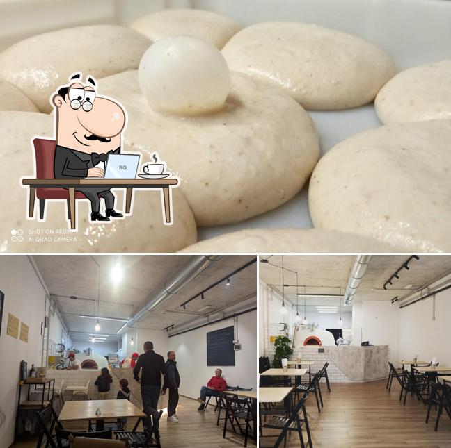 Questa è la foto che raffigura la interni e cibo di Pizzeria Paestum