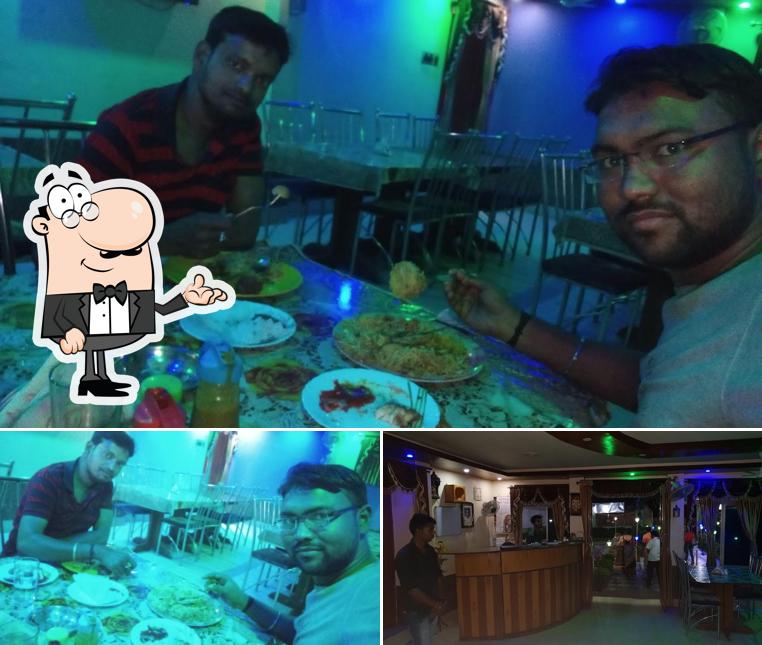 Take a seat at one of the tables at Bejoy Food Plaza