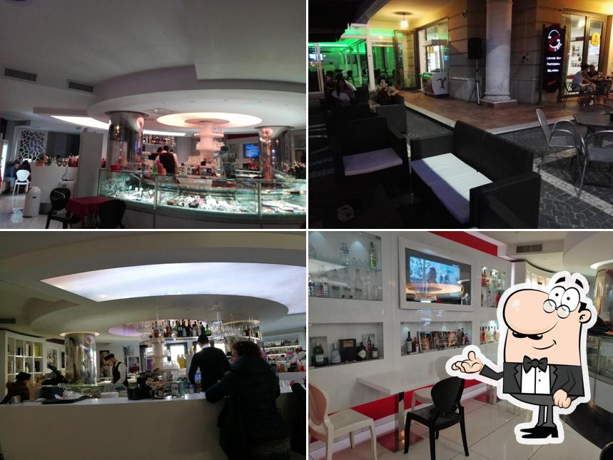 Dai un'occhiata agli interni di Movida Cafè Lounge