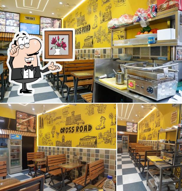Check out how CROSS ROAD Cafe And Restro looks inside