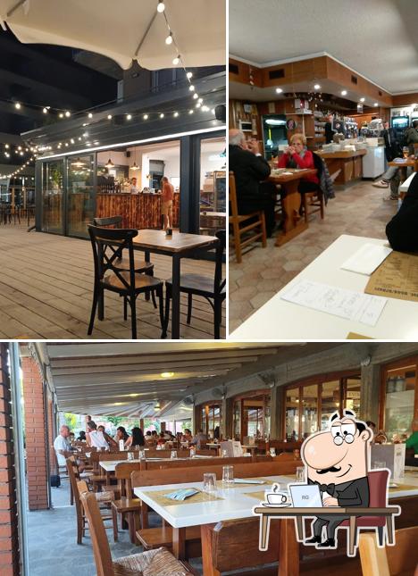 Dai un'occhiata agli interni di Pizzeria La Taverna