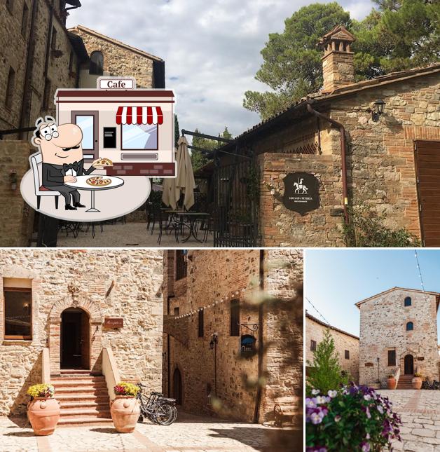 Puoi goderti l'aria fresca da seduto all'esterno di Borgo Petroro
