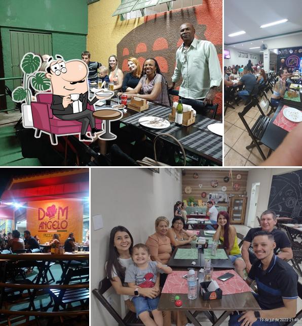 Sente em uma das mesas no Pizzaria Dom Angelo - Rodízio