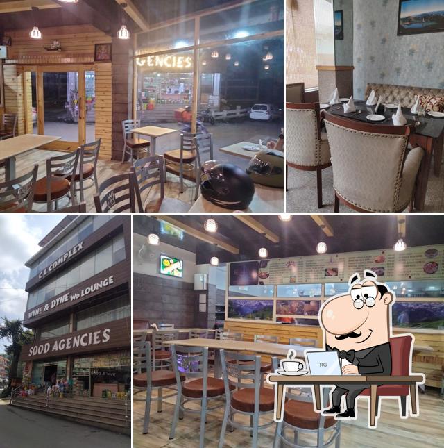 Take a seat at one of the tables at WYNE & DYNE - WD Lounge