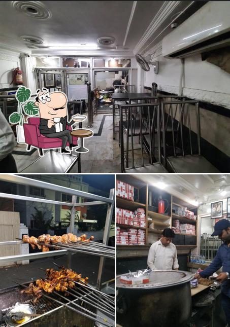 Take a seat at one of the tables at Sakhawat Restaurant