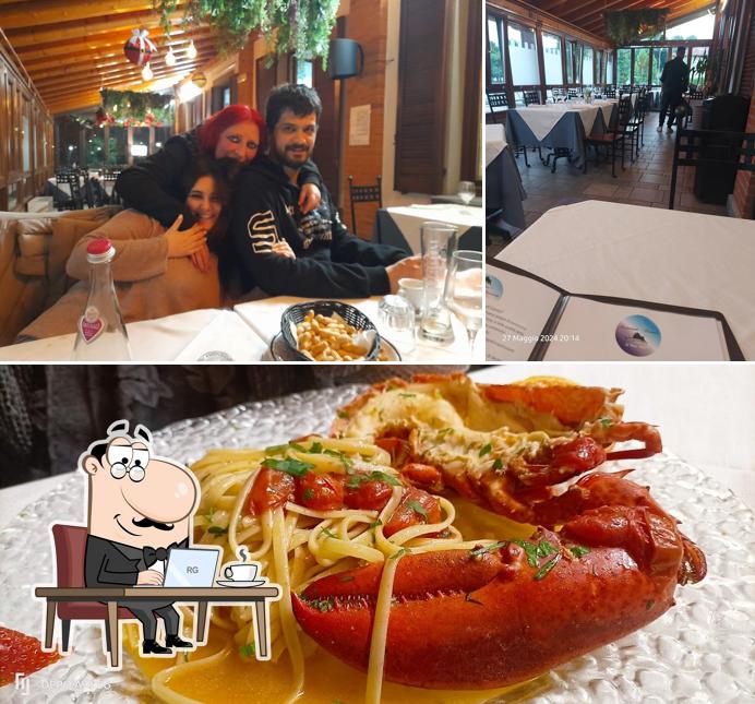 La foto della interni e cibo di Al Pesce Vela Cantù