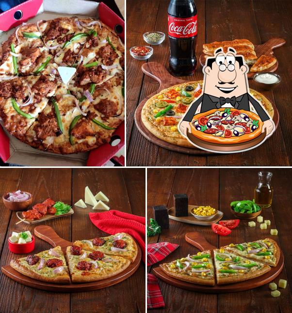 Get pizza at Ovenstory Pizza Perambur