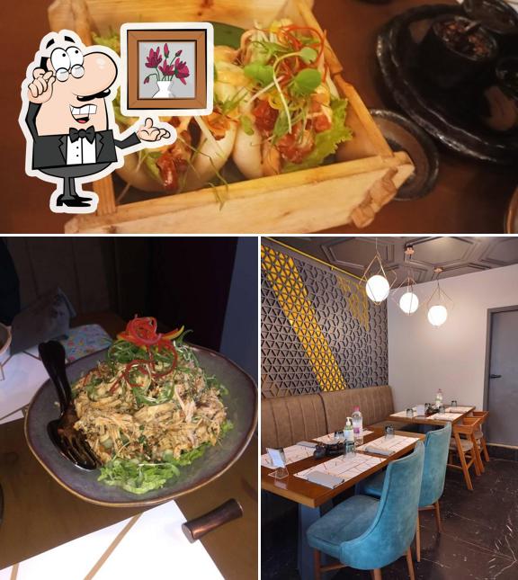 Take a look at the photo displaying interior and food at STICKY RICE