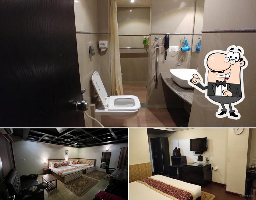 Take a seat at one of the tables at Hotel Nagpur Ashok