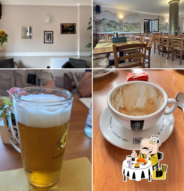 Questa è la foto che presenta la cibo e interni di Pizzeria Campara