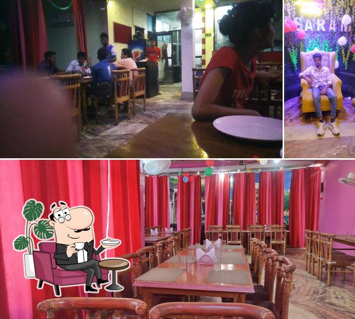 Take a seat at one of the tables at Wah Lajawab Manage By Green Planet Restaurants