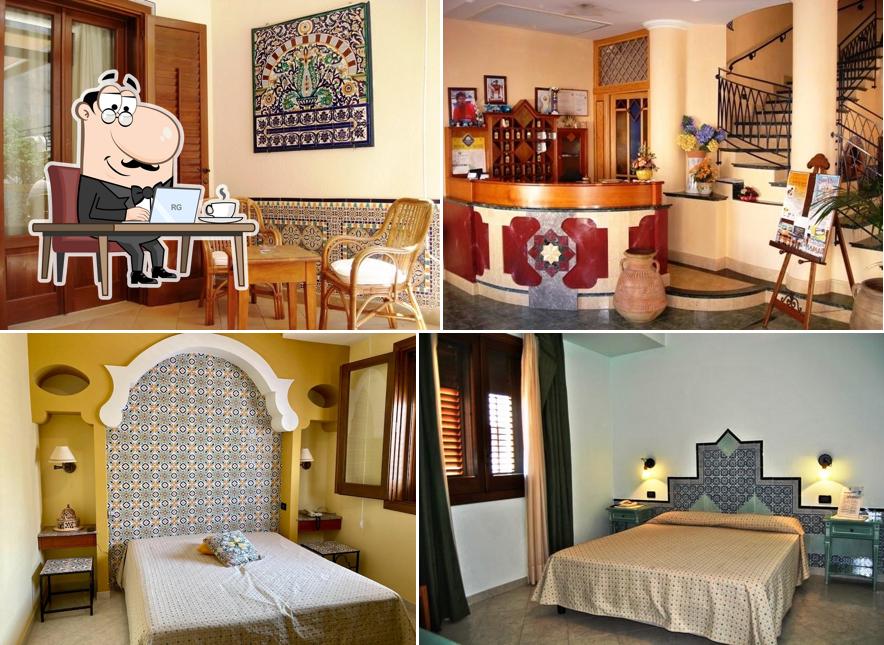 Siediti a un tavolo di Hotel Sicilya