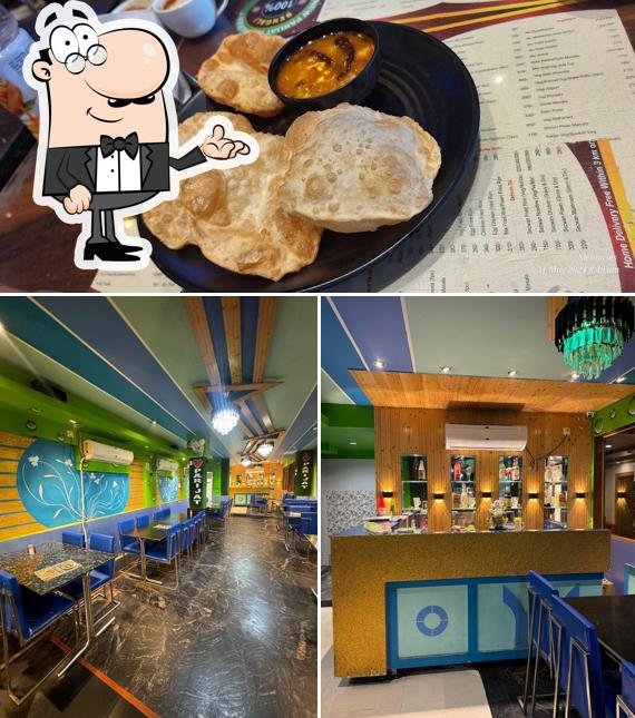 Among various things one can find interior and food at New Parijat Restaurant