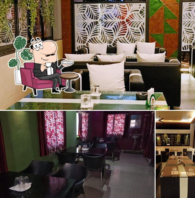 Take a seat at one of the tables at Hotel Nivant Resto Bar & launch