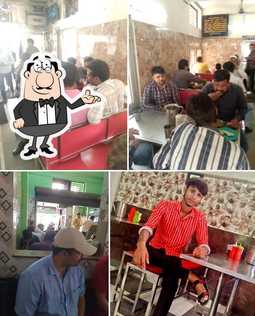 This is the picture depicting interior and drink at Haji Korma Biryani Centre