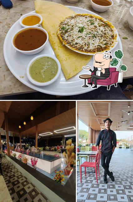 The photo of interior and food at Swad Food Land