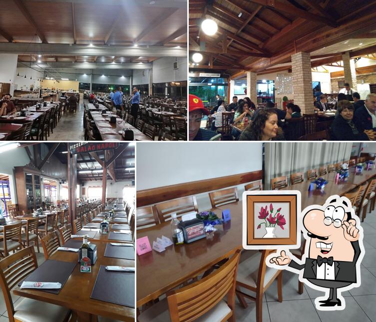 Veja imagens do interior do Pizzaria Vesúvio