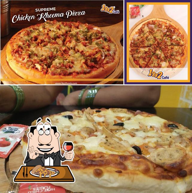 Try out pizza at 1By2 Cafe - Mogappair West